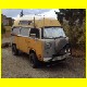 T2 Camper Syncro mit hochgelegten Frontscheinwerfern gelb 01.html